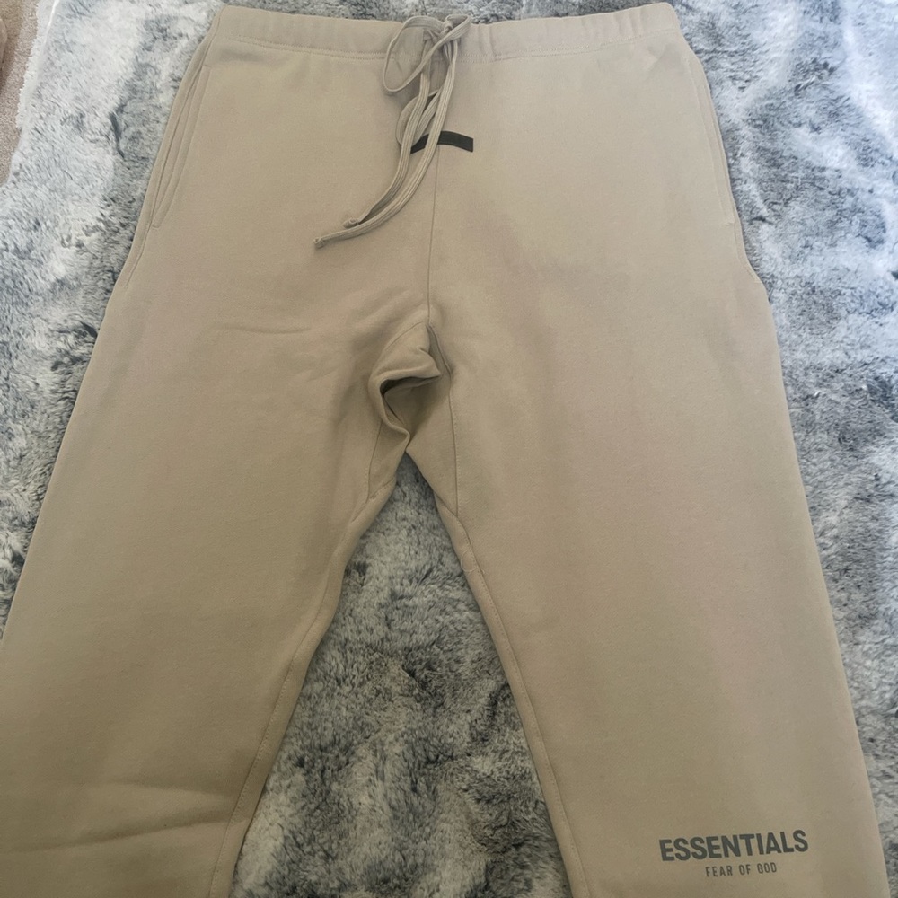 Men’s ESSENTIALS sweatpants in Tan. Size XL.